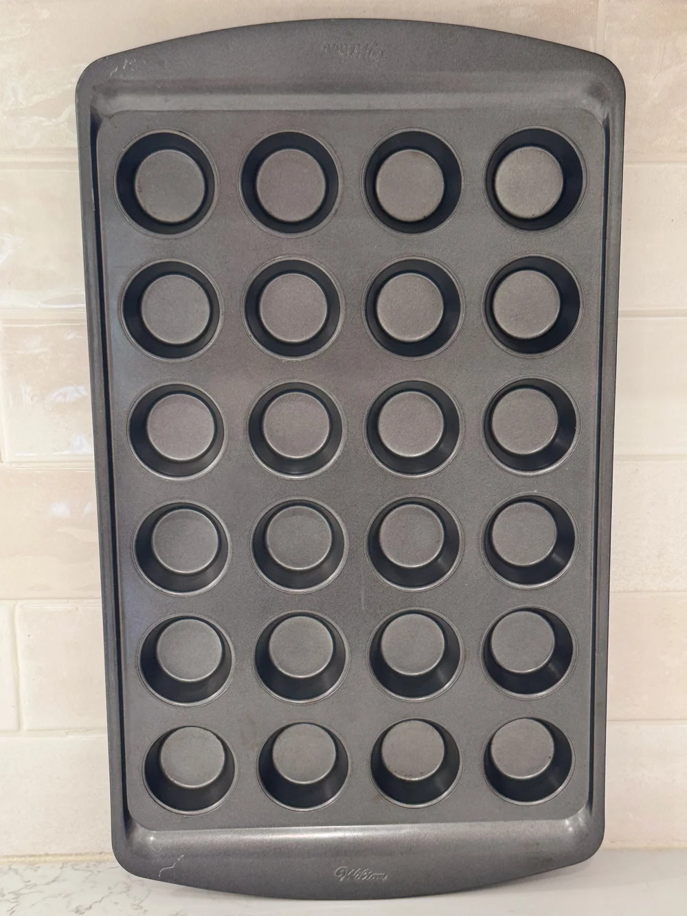 Genuine Wilton Perfect Results 24-Cup Non-Stick Mini Muffin & Cupcake Baking Pan